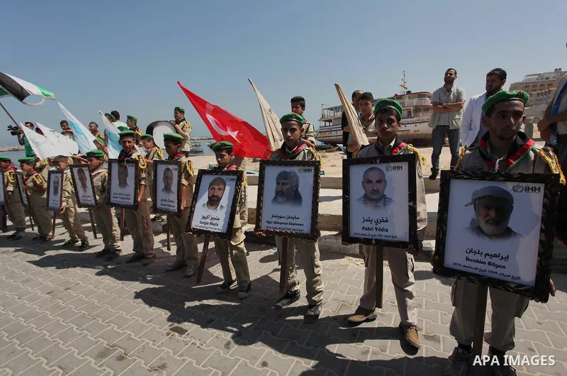 Palestinians hold flags during a rally marking the 6th anniversary of the Mavi Marmara Gaza flotilla incident, at the seaport of Gaza City May 31, 2016. Nine activists, eight Turkish and one Turkish-American, died on May...
