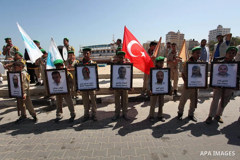 Palestinians hold flags during a rally marking the 6th anniversary of the Mavi Marmara Gaza flotilla incident, at the seaport of Gaza City May 31, 2016. Nine activists, eight Turkish and one Turkish-American, died on May...
