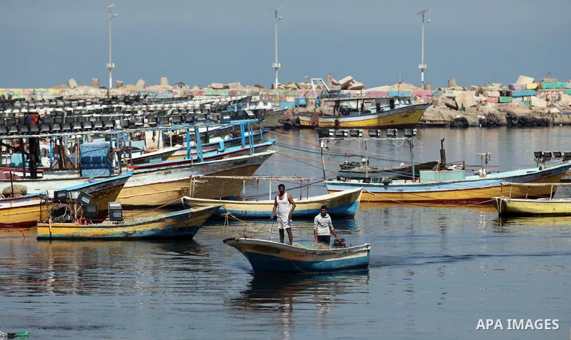 Palestinians ride a boat during a rally ahead of the 6th anniversary of the Mavi Marmara Gaza flotilla incident, at the seaport of Gaza City May 29, 2016. Nine activists, eight Turkish and one Turkish-American, died on M...
