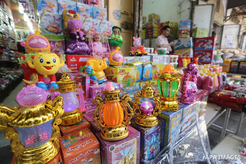 A Palestinian vendor displays a traditional lantern known in Arabic as "Fanous" in a market in Gaza city as the faithful prepare for the start of the Muslim holy fasting month of Ramadan on May 31, 2016. More than 1.5 bi...