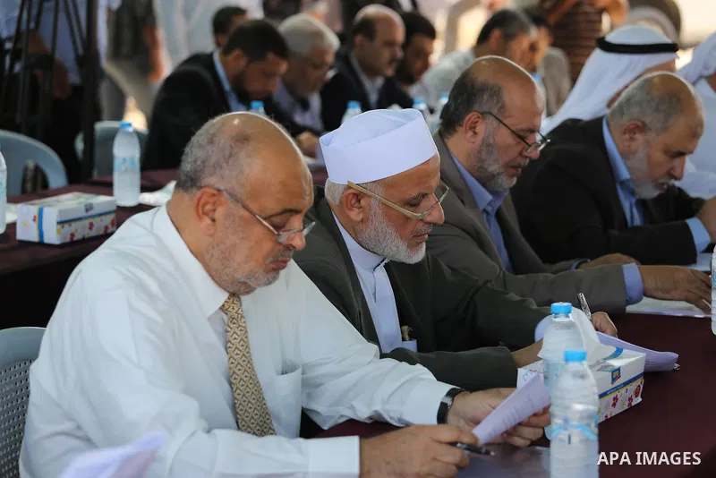 Members of the Palestinian legislative council from Hamas movement attend a meeting at the legislative council, at seaport of Gaza city, on 01 June 2016. Photo by Mohammed Asad