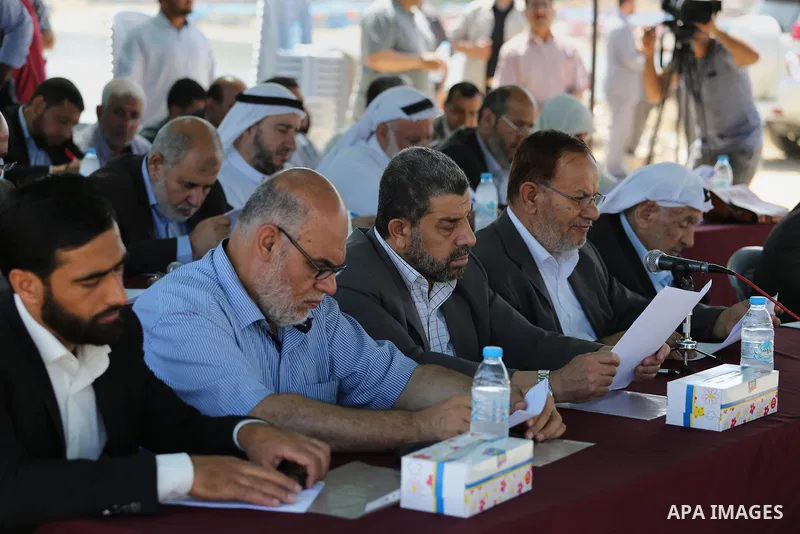 Members of the Palestinian legislative council from Hamas movement attend a meeting at the legislative council, at seaport of Gaza city, on 01 June 2016. Photo by Mohammed Asad