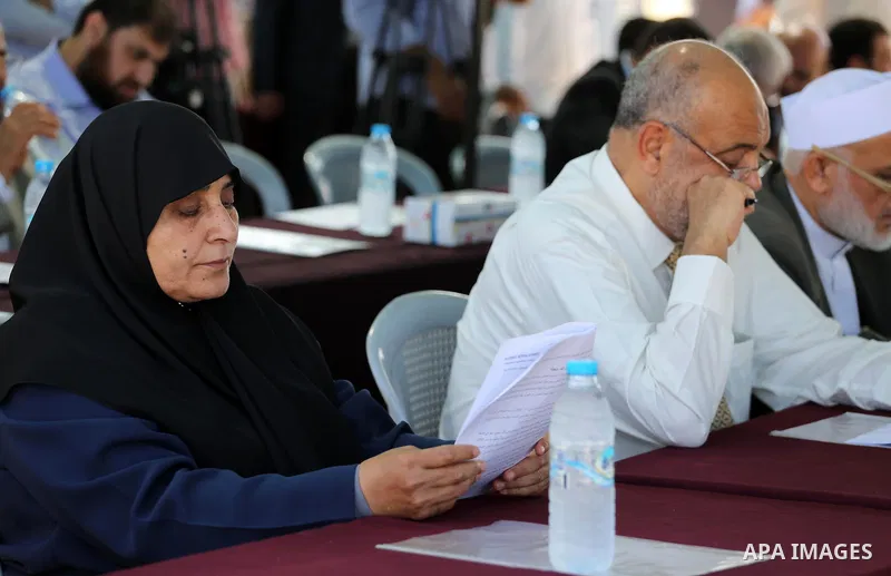 Members of the Palestinian legislative council from Hamas movement attend a meeting at the legislative council, at seaport of Gaza city, on 01 June 2016. Photo by Mohammed Asad