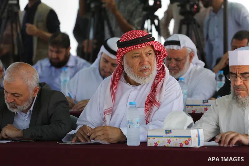 Members of the Palestinian legislative council from Hamas movement attend a meeting at the legislative council, at seaport of Gaza city, on 01 June 2016. Photo by Mohammed Asad