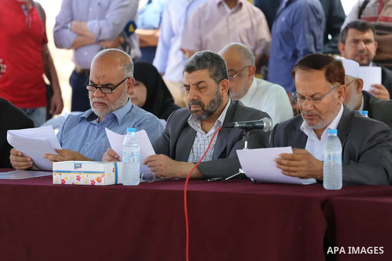 Members of the Palestinian legislative council from Hamas movement attend a meeting at the legislative council, at seaport of Gaza city, on 01 June 2016. Photo by Mohammed Asad