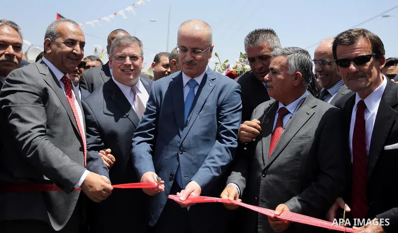 Palestinian Prime Minister Rami Hamdallah attends the opening of Nablus-Hawara road, in the West Bank city of Nablus, on June 01, 2016. Photo by Prime Minister Office