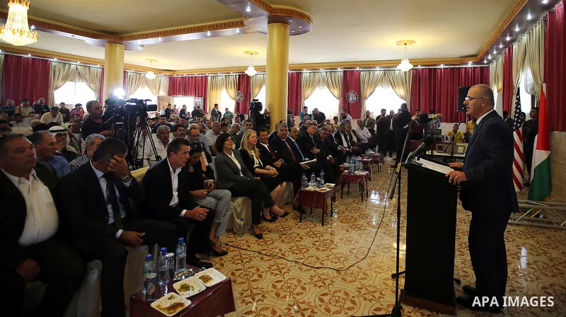 Palestinian Prime Minister Rami Hamdallah speaks during the opening of Nablus-Hawara road, in the West Bank city of Nablus, on June 01, 2016. Photo by Prime Minister Office