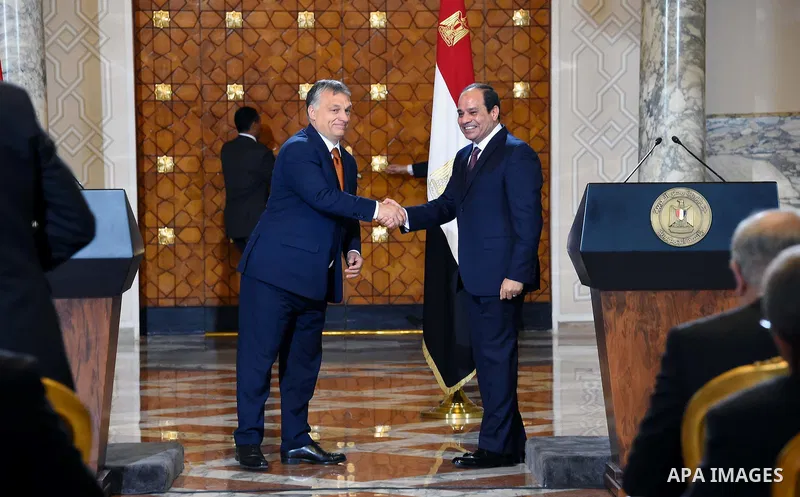 Egyptian President Abdel-Fattah al-Sisi shake hands with Hungarian Prime Minister Viktor Orban following a meeting at the presidential palace in Cairo, Egypt, on June 1, 2016. Photo by Egyptian President Office