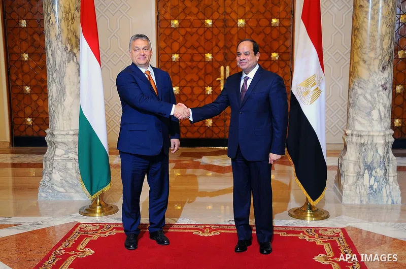 Egyptian President Abdel-Fattah al-Sisi shake hands with Hungarian Prime Minister Viktor Orban following a meeting at the presidential palace in Cairo, Egypt, on June 1, 2016. Photo by Egyptian President Office