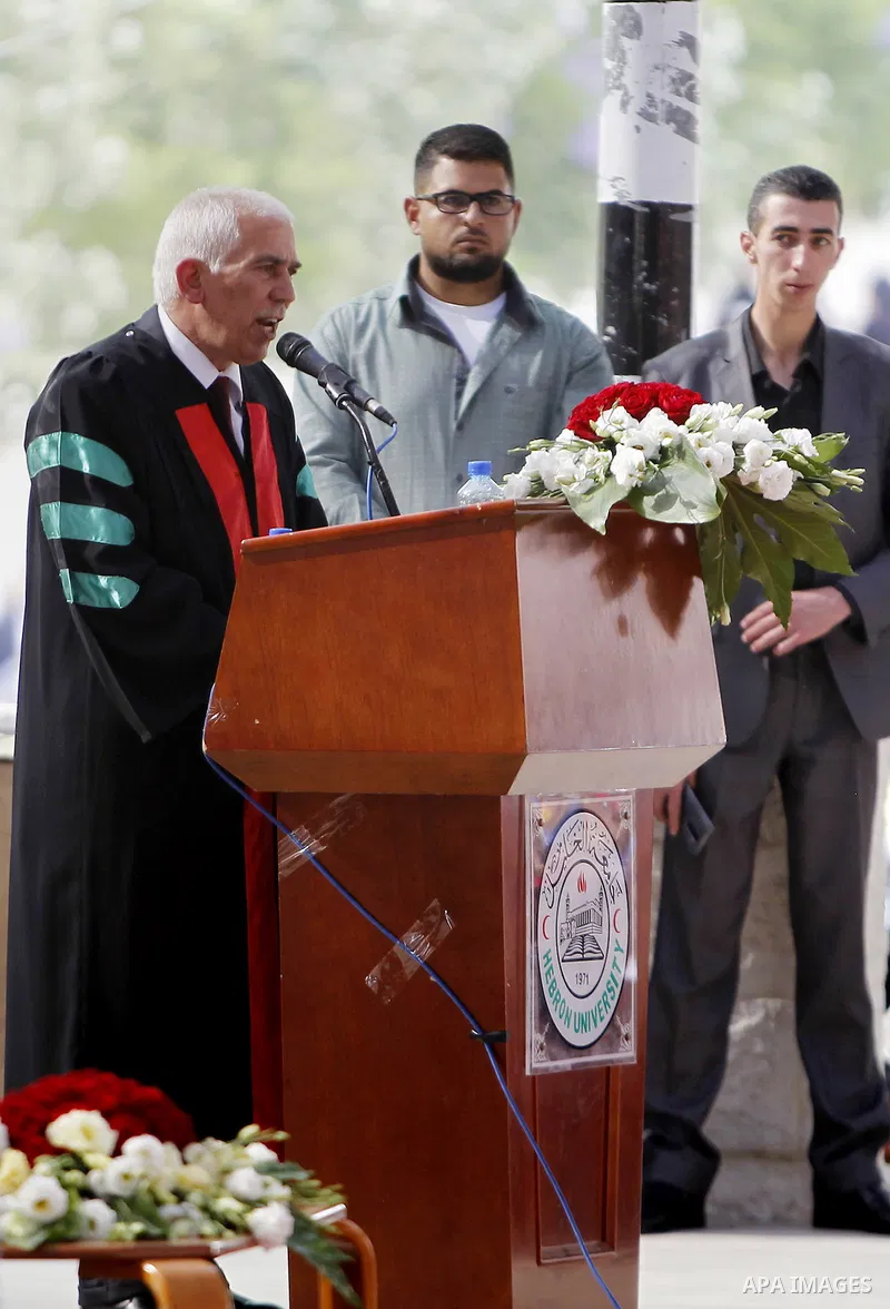 Palestinian students attend their graduation ceremony at the end of the academic year on June 01, 2016 at Hebron University in the West Bank city of Hebron. Photo by Wisam Hashlamoun
