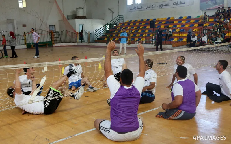 Disabled Palestinians take part in the closing ceremony of the wheelchairs basketball training camp organised by the International Committee of the Red Cross (ICRC) , in Gaza city on june 2, 2016. Photo by Nidal Alwaheid...