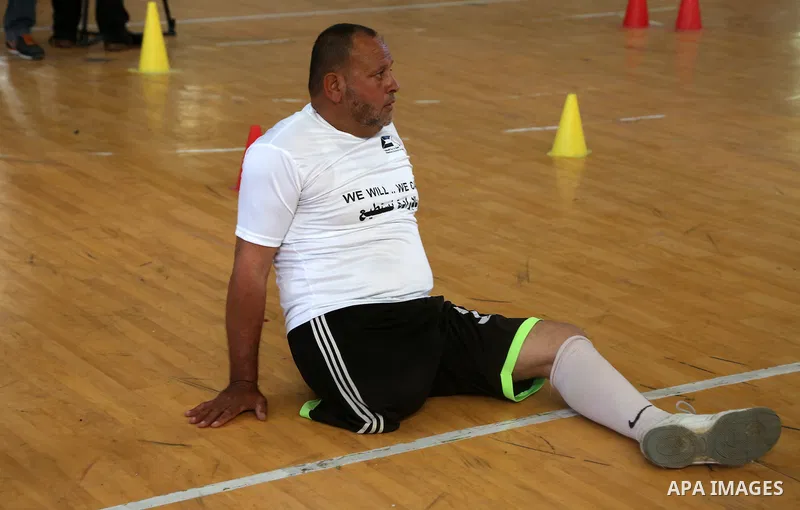 Disabled Palestinians take part in the closing ceremony of the wheelchairs basketball training camp organised by the International Committee of the Red Cross (ICRC) , in Gaza city on june 2, 2016. Photo by Nidal Alwaheid...