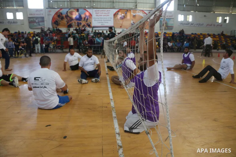 Disabled Palestinians take part in the closing ceremony of the wheelchairs basketball training camp organised by the International Committee of the Red Cross (ICRC) , in Gaza city on june 2, 2016. Photo by Nidal Alwaheid...