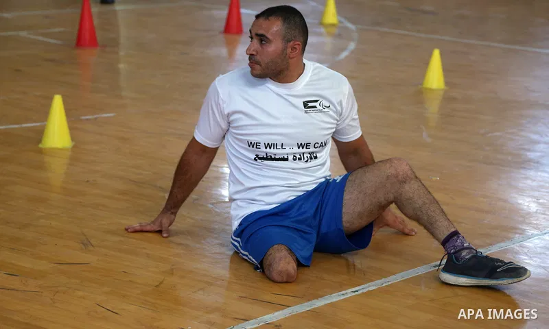 Disabled Palestinians take part in the closing ceremony of the wheelchairs basketball training camp organised by the International Committee of the Red Cross (ICRC) , in Gaza city on june 2, 2016. Photo by Nidal Alwaheid...