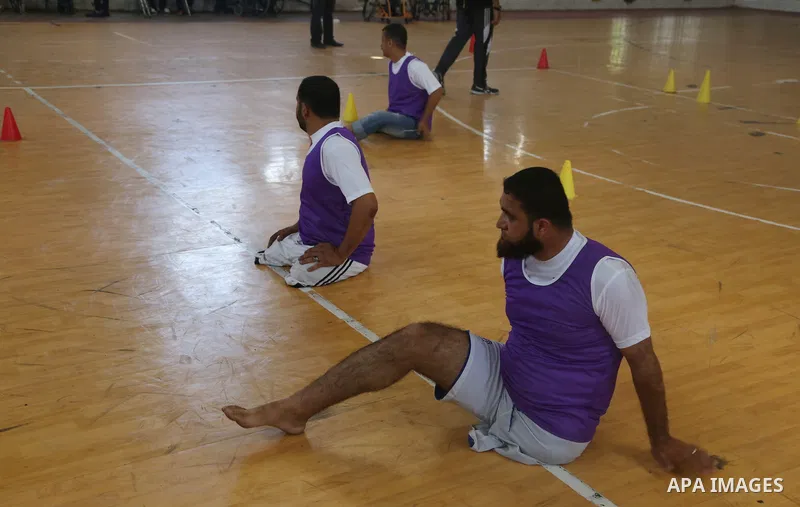 Disabled Palestinians take part in the closing ceremony of the wheelchairs basketball training camp organised by the International Committee of the Red Cross (ICRC) , in Gaza city on june 2, 2016. Photo by Nidal Alwaheid...
