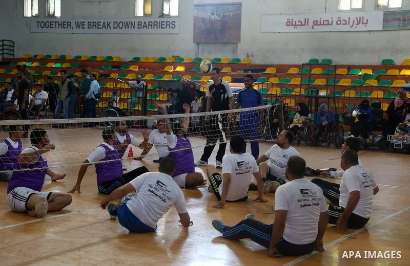 Disabled Palestinians take part in the closing ceremony of the wheelchairs basketball training camp organised by the International Committee of the Red Cross (ICRC) , in Gaza city on june 2, 2016. Photo by Nidal Alwaheid...