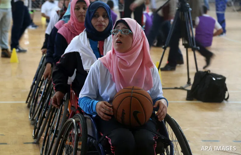 Disabled Palestinians take part in the closing ceremony of the wheelchairs basketball training camp organised by the International Committee of the Red Cross (ICRC) , in Gaza city on june 2, 2016. Photo by Nidal Alwaheid...