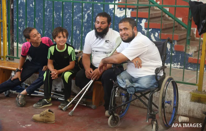 Disabled Palestinians take part in the closing ceremony of the wheelchairs basketball training camp organised by the International Committee of the Red Cross (ICRC) , in Gaza city on june 2, 2016. Photo by Nidal Alwaheid...