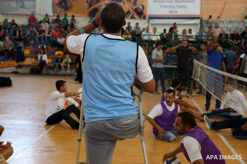 Disabled Palestinians take part in the closing ceremony of the wheelchairs basketball training camp organised by the International Committee of the Red Cross (ICRC) , in Gaza city on june 2, 2016. Photo by Nidal Alwaheid...