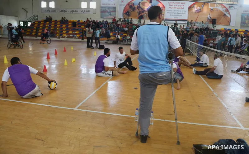 Disabled Palestinians take part in the closing ceremony of the wheelchairs basketball training camp organised by the International Committee of the Red Cross (ICRC) , in Gaza city on june 2, 2016. Photo by Nidal Alwaheid...