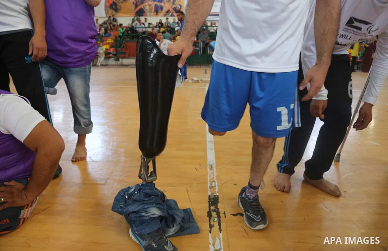 Disabled Palestinians take part in the closing ceremony of the wheelchairs basketball training camp organised by the International Committee of the Red Cross (ICRC) , in Gaza city on june 2, 2016. Photo by Nidal Alwaheid...