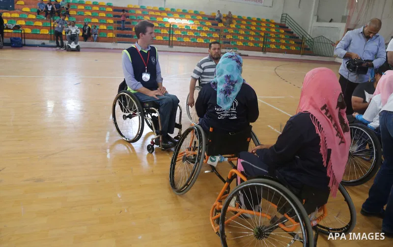 Disabled Palestinians take part in the closing ceremony of the wheelchairs basketball training camp organised by the International Committee of the Red Cross (ICRC) , in Gaza city on june 2, 2016. Photo by Nidal Alwaheid...