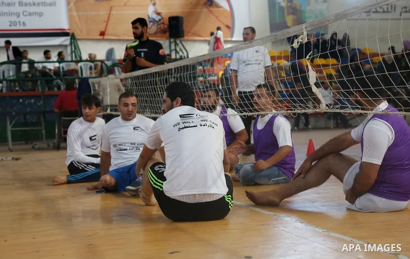 Disabled Palestinians take part in the closing ceremony of the wheelchairs basketball training camp organised by the International Committee of the Red Cross (ICRC) , in Gaza city on june 2, 2016. Photo by Nidal Alwaheid...