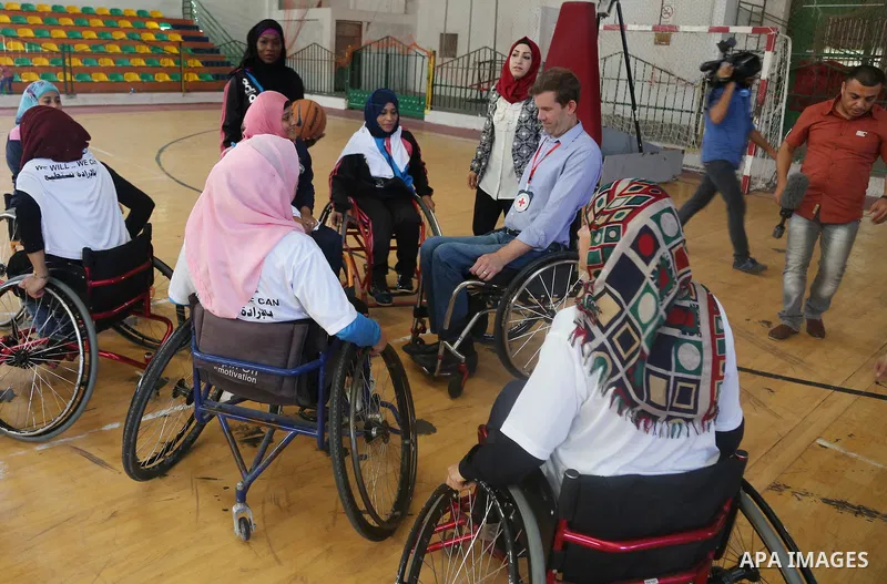 Disabled Palestinians take part in the closing ceremony of the wheelchairs basketball training camp organised by the International Committee of the Red Cross (ICRC) , in Gaza city on june 2, 2016. Photo by Nidal Alwaheid...