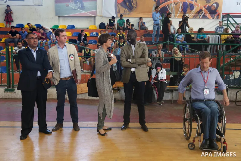Disabled Palestinians take part in the closing ceremony of the wheelchairs basketball training camp organised by the International Committee of the Red Cross (ICRC) , in Gaza city on june 2, 2016. Photo by Nidal Alwaheid...