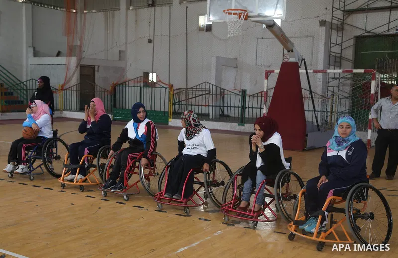 Disabled Palestinians take part in the closing ceremony of the wheelchairs basketball training camp organised by the International Committee of the Red Cross (ICRC) , in Gaza city on june 2, 2016. Photo by Nidal Alwaheid...