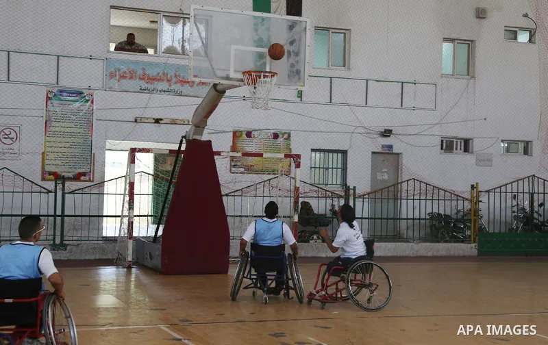 Disabled Palestinians take part in the closing ceremony of the wheelchairs basketball training camp organised by the International Committee of the Red Cross (ICRC) , in Gaza city on june 2, 2016. Photo by Nidal Alwaheid...