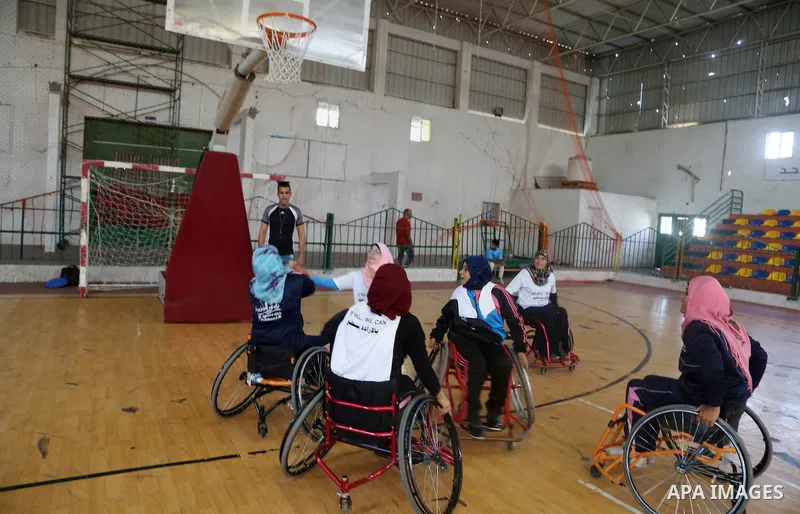 Disabled Palestinians take part in the closing ceremony of the wheelchairs basketball training camp organised by the International Committee of the Red Cross (ICRC) , in Gaza city on june 2, 2016. Photo by Nidal Alwaheid...