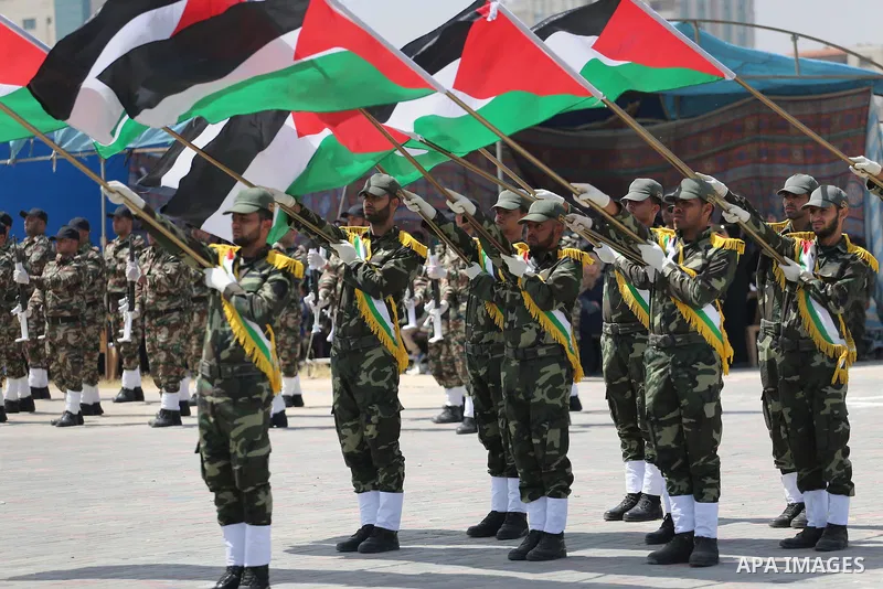 Member of Palestinian security forces display their skills during a military graduation ceremony in Gaza City June 2, 2016. Photo by Mohammed Asad