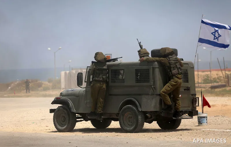 Member of Palestinian security forces display their skills during a military graduation ceremony in Gaza City June 2, 2016. Photo by Mohammed Asad