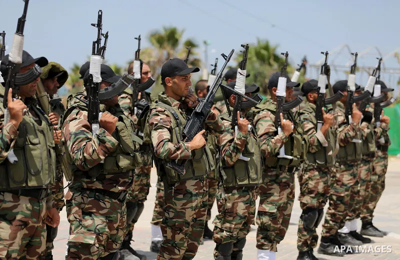 Member of Palestinian security forces display their skills during a military graduation ceremony in Gaza City June 2, 2016. Photo by Mohammed Asad