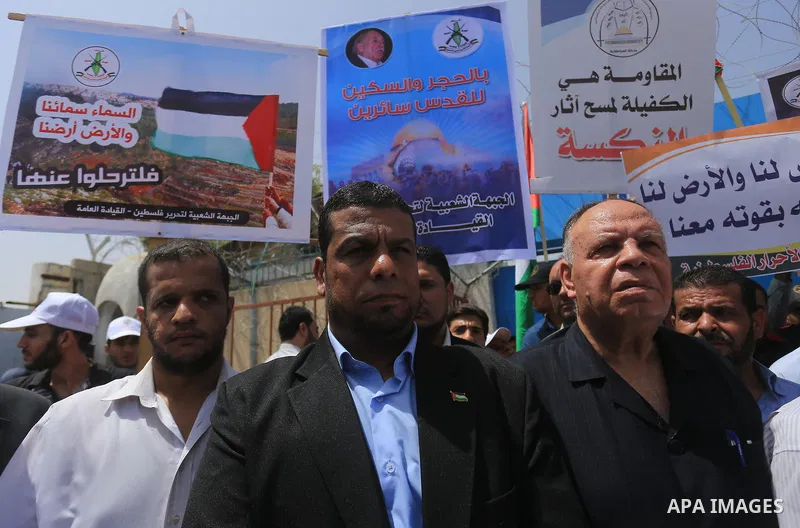 Palestinians take part in a protest to mark Naksa Day (setback), in front of the headquarter United Nation "UNSCO" in Gaza City, on June 04, 2016. Palestinians mark "Naksa Day" to mourn the 49th anniversary of Israel's o...