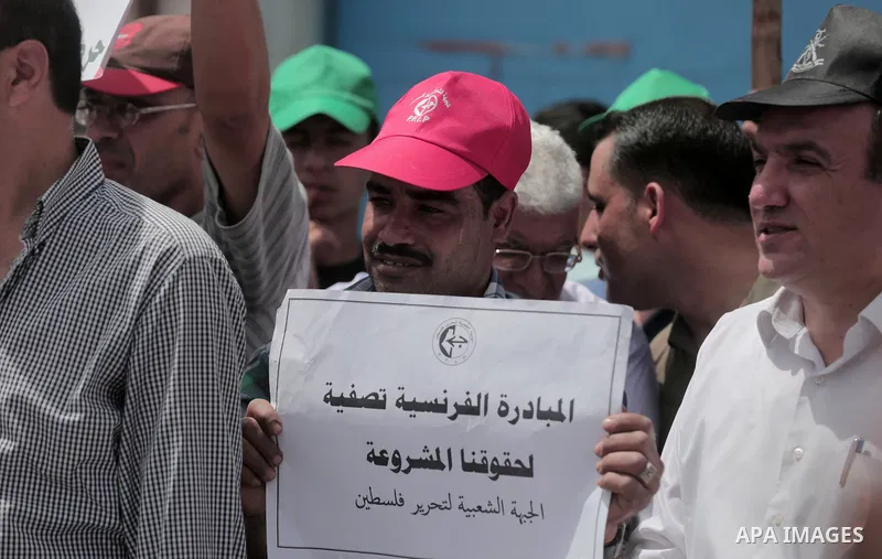 Palestinians take part in a protest to mark Naksa Day (setback), in front of the headquarter United Nation "UNSCO" in Gaza City, on June 04, 2016. Palestinians mark "Naksa Day" to mourn the 49th anniversary of Israel's o...