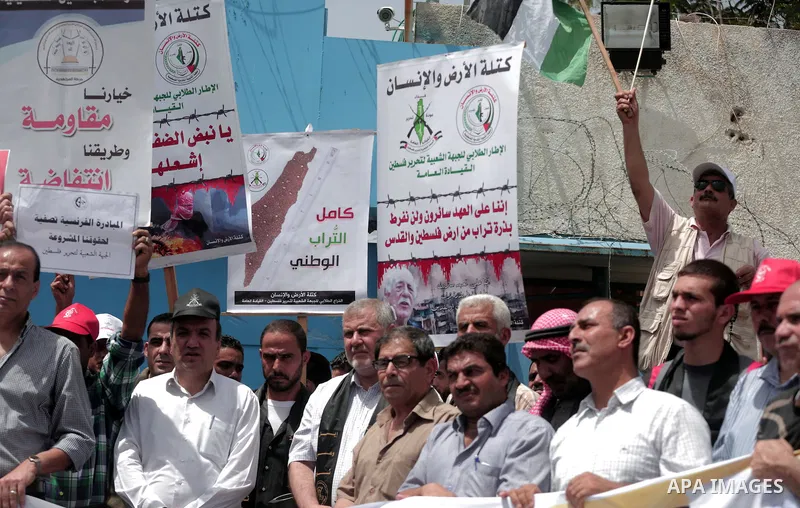 Palestinians take part in a protest to mark Naksa Day (setback), in front of the headquarter United Nation "UNSCO" in Gaza City, on June 04, 2016. Palestinians mark "Naksa Day" to mourn the 49th anniversary of Israel's o...