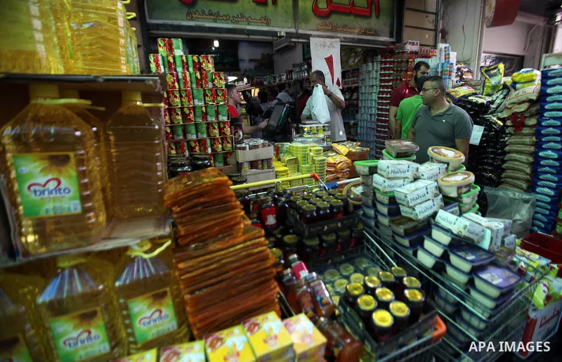 Palestinians shop at a traditional market in preparation for the holy month of Ramadan in the west bank city of Nablus on June 4,2016. Muslims around the world refrain from eating, drinking and sexual intercourse from da...