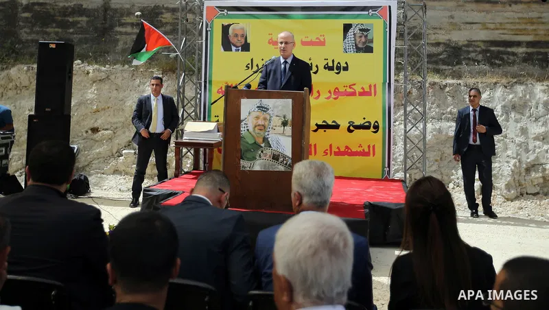 Palestinian Prime Minister Rami Hamdallah puts the corner stone for the Martyrs of the High school for Girls in the West Bank city of Nablus on June 4.2016 Photo by Prime Minister Office