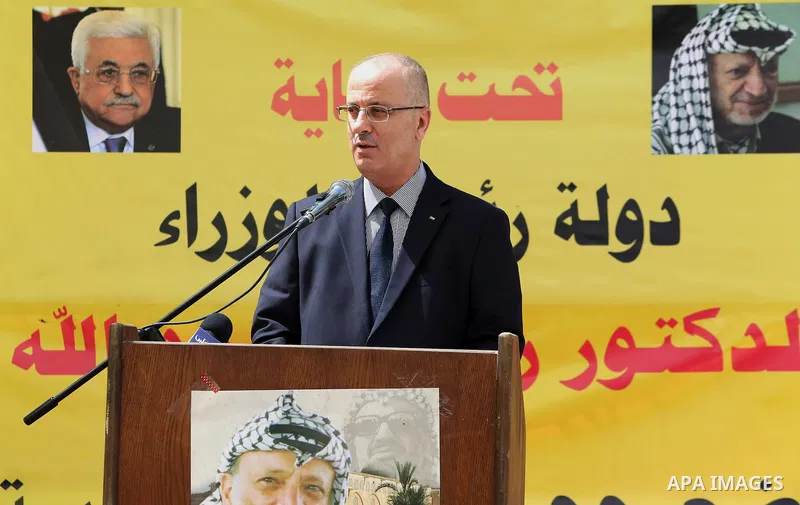 Palestinian Prime Minister Rami Hamdallah puts the corner stone for the Martyrs of the High school for Girls in the West Bank city of Nablus on June 4.2016 Photo by Prime Minister Office