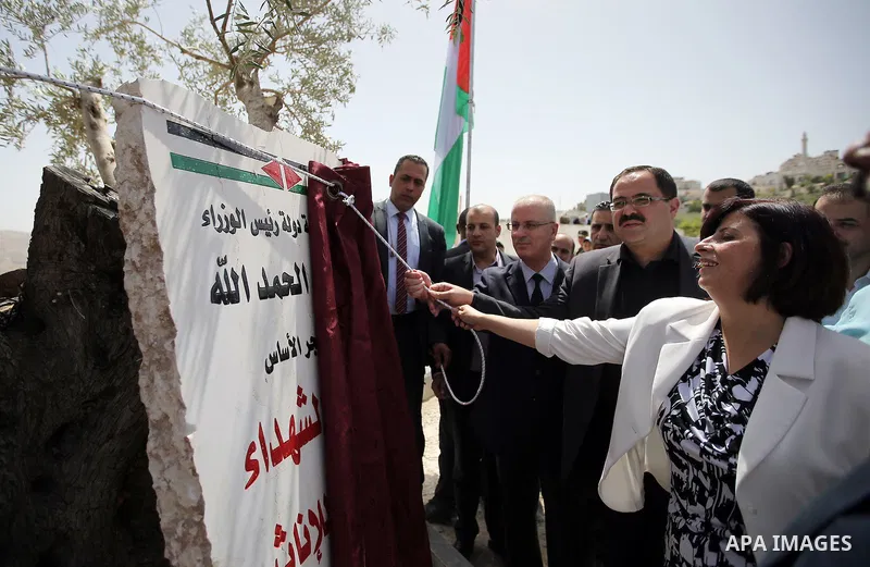 Palestinian Prime Minister Rami Hamdallah puts the corner stone for the Martyrs of the High school for Girls in the West Bank city of Nablus on June 4.2016 Photo by Prime Minister Office