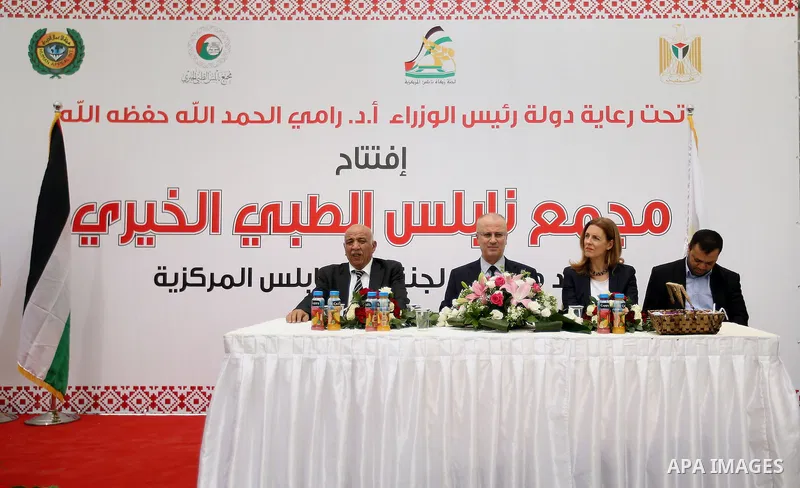 Palestinian Prime Minister Rami Hamdallah take part in the opening of the Nablus Medical Complex charitable in the West Bank city of Nablus on June 4,2016. Photo by Prime Minister Office