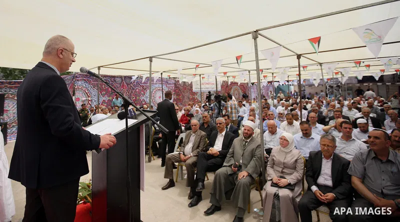 Palestinian Prime Minister Rami Hamdallah take part in the opening of the Nablus Medical Complex charitable in the West Bank city of Nablus on June 4,2016. Photo by Prime Minister Office
