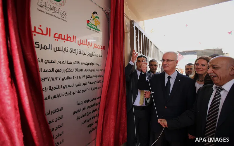 Palestinian Prime Minister Rami Hamdallah take part in the opening of the Nablus Medical Complex charitable in the West Bank city of Nablus on June 4,2016. Photo by Prime Minister Office