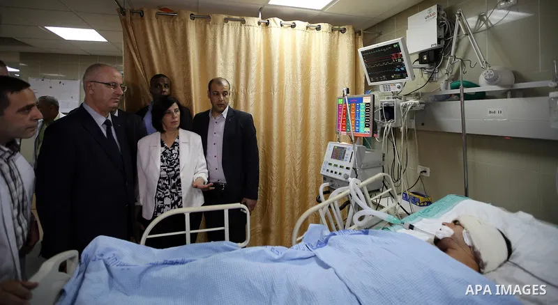 Palestinian Prime Minister Rami Hamdallah take part in the opening of the Nablus Medical Complex charitable in the West Bank city of Nablus on June 4,2016. Photo by Prime Minister Office