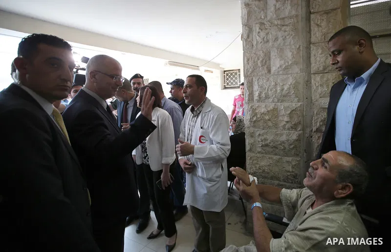 Palestinian Prime Minister Rami Hamdallah take part in the opening of the Nablus Medical Complex charitable in the West Bank city of Nablus on June 4,2016. Photo by Prime Minister Office