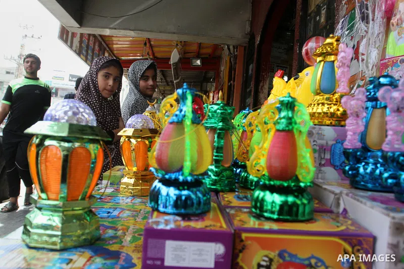 Palestinians shop at a traditional market in preparation for the holy month of Ramadan in Rafah in the southern Gaza strip on June 4,2016. Muslims around the world refrain from eating, drinking and sexual intercourse fro...