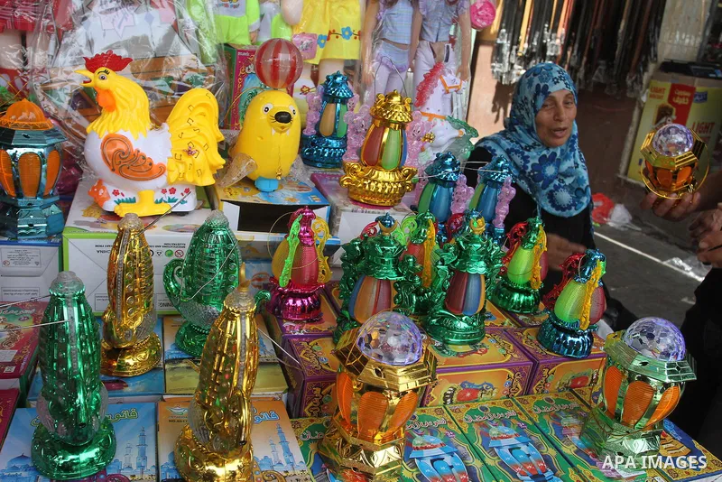 Palestinians shop at a traditional market in preparation for the holy month of Ramadan in Rafah in the southern Gaza strip on June 4,2016. Muslims around the world refrain from eating, drinking and sexual intercourse fro...