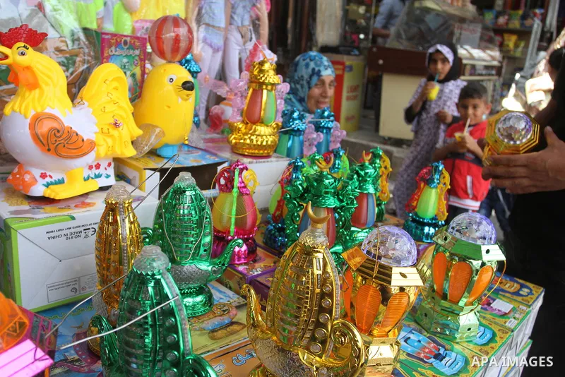 Palestinians shop at a traditional market in preparation for the holy month of Ramadan in Rafah in the southern Gaza strip on June 4,2016. Muslims around the world refrain from eating, drinking and sexual intercourse fro...